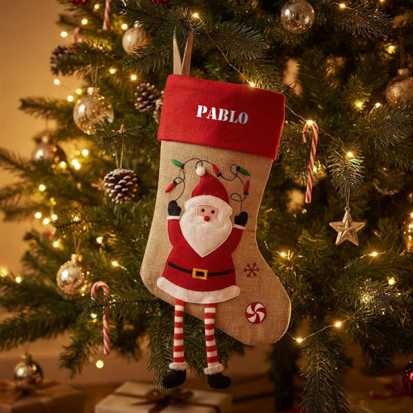 Kerstsok met geborduurde kerstfiguren en naam