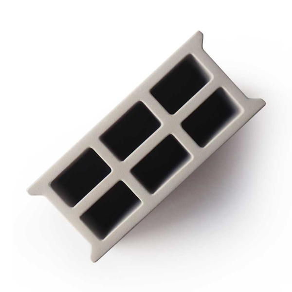 Potloodhouder met een gegraveerde betonblok