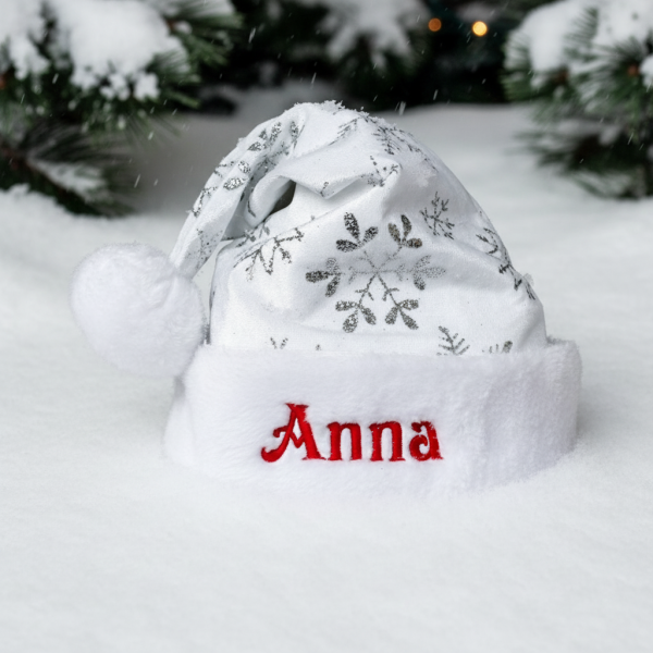 Kerstman muts borduren - wit met sneeuwvlokken